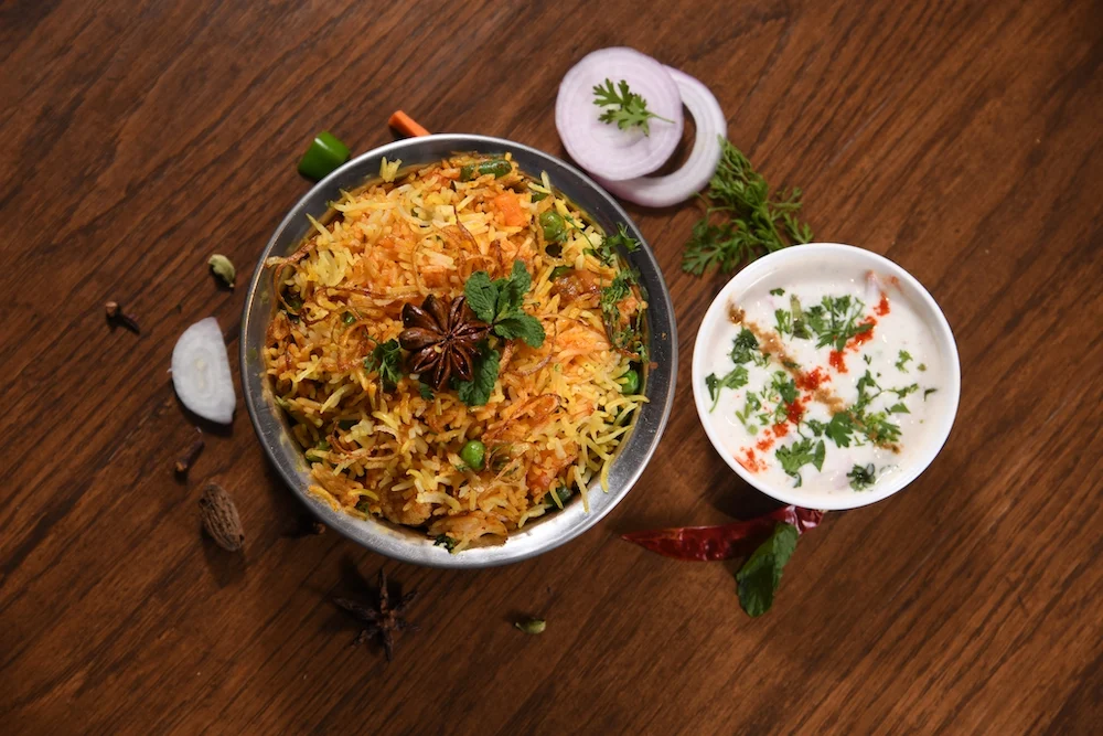 Vegetable biryani in serving bowl